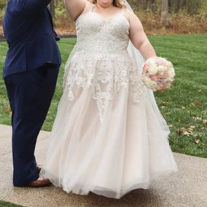 Size 24 wedding dress! Worn once, in really good condition.